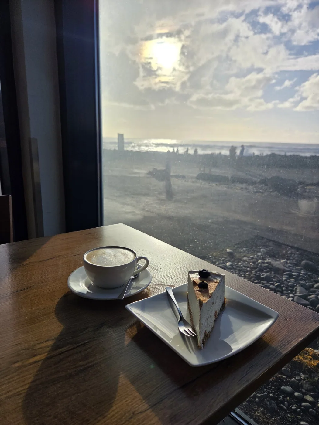Coffee and skyr cake overlooking Reynisfjara